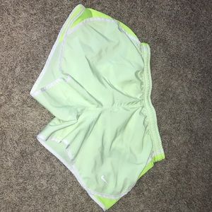 I am selling neon yellow/green Nike shorts😋